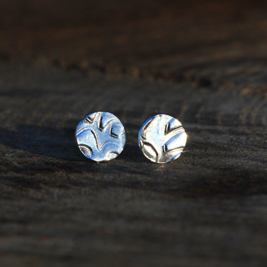 Small silver stud earrings. Textured abstract chunky pattern. 925 posts and scroll backs. Handmade and made to order. 