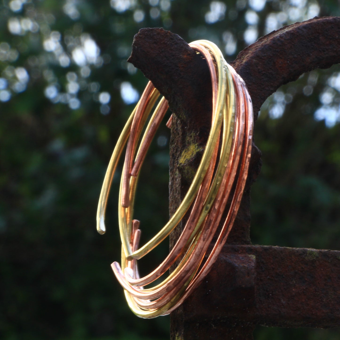 Thin copper and brass bangles. Adjustable handmade copper and brass bracelets.